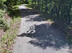 a picture of a not very wide road